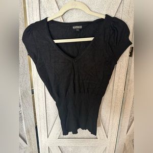 Black express knit top with puff sleeves